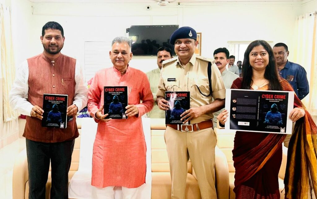 Higher Education Minister releases book titled “Cyber Crime Prevention & Fraud Management” in Indore.